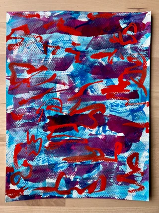 Red and blue horizontal brushwork on a hand-painted paper cover