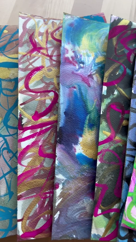 A close view across original painted cover papers.